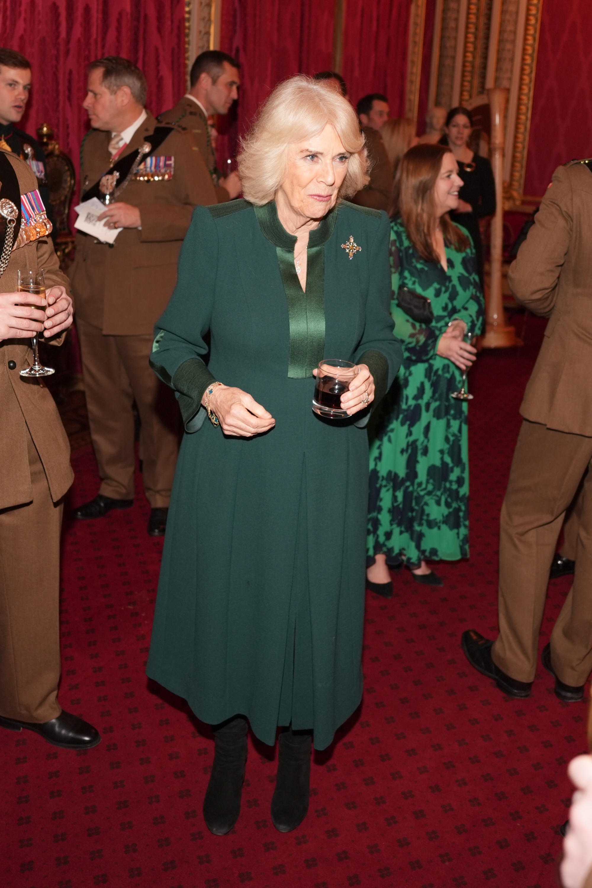 Queen Camilla, Buckingham Palace, King Charles III, military families, green dress, reception